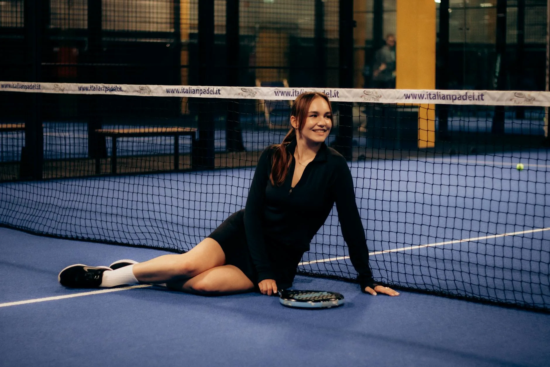 Blue padel court with glass walls — where padel balls are tested