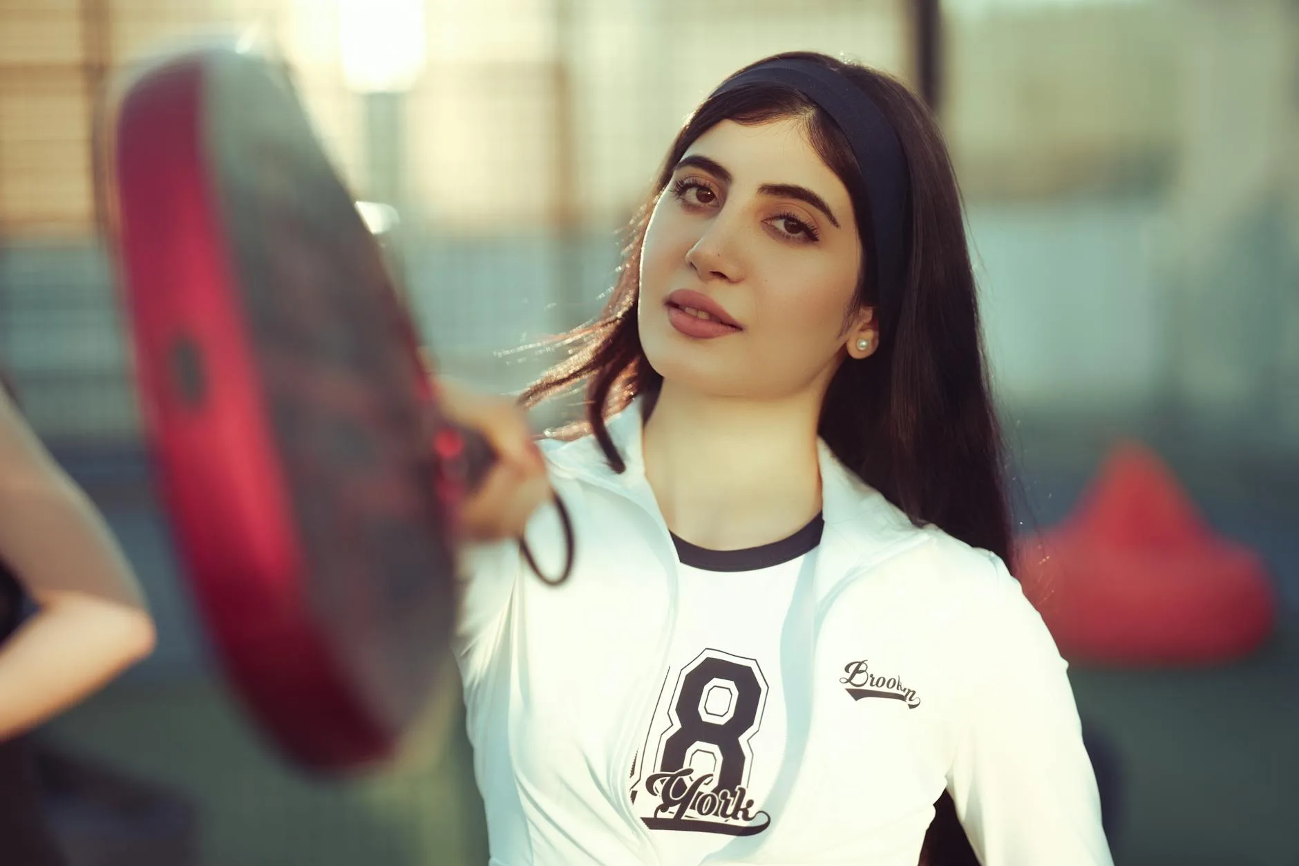 Padel player gripping racket on court during a match