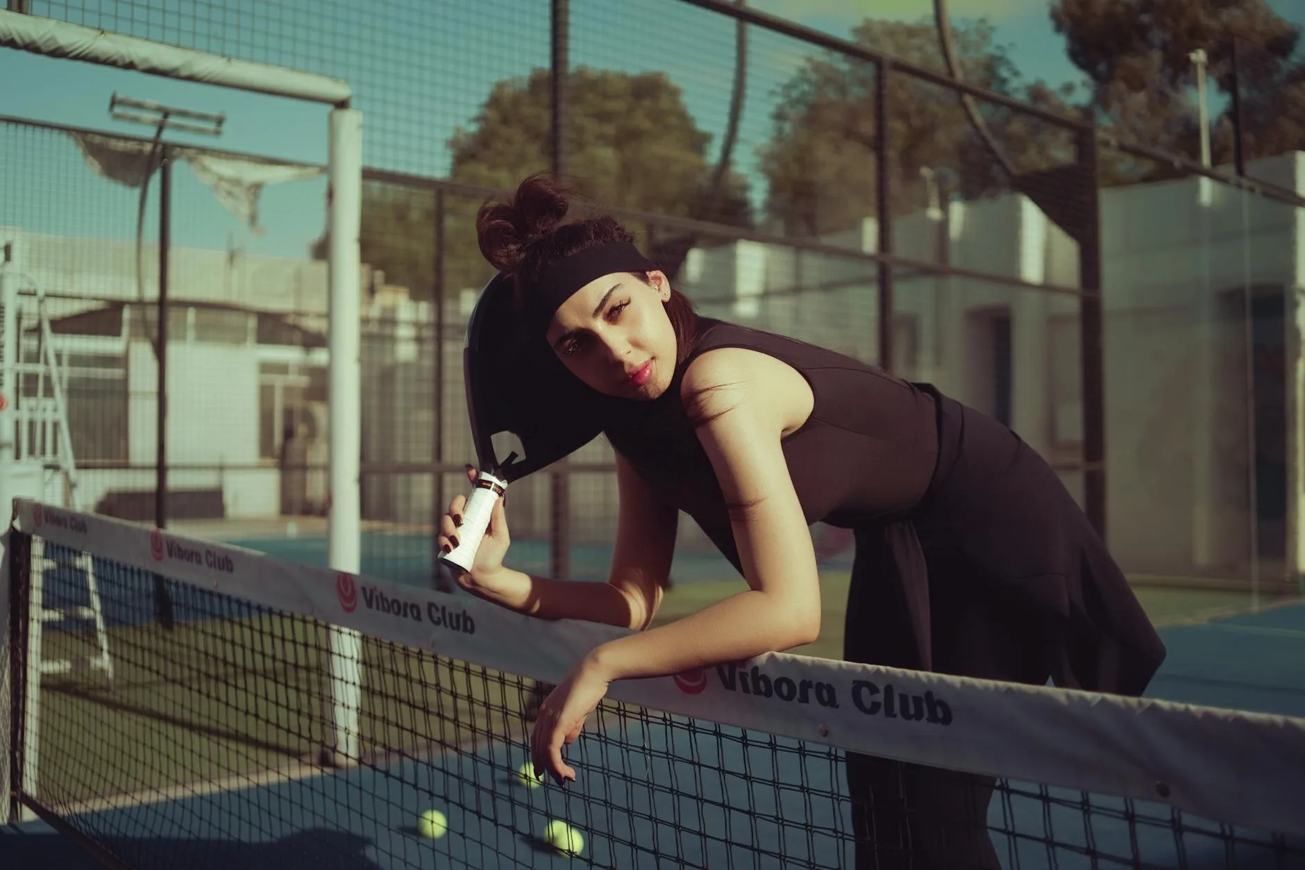 Padel player in action during a competitive match