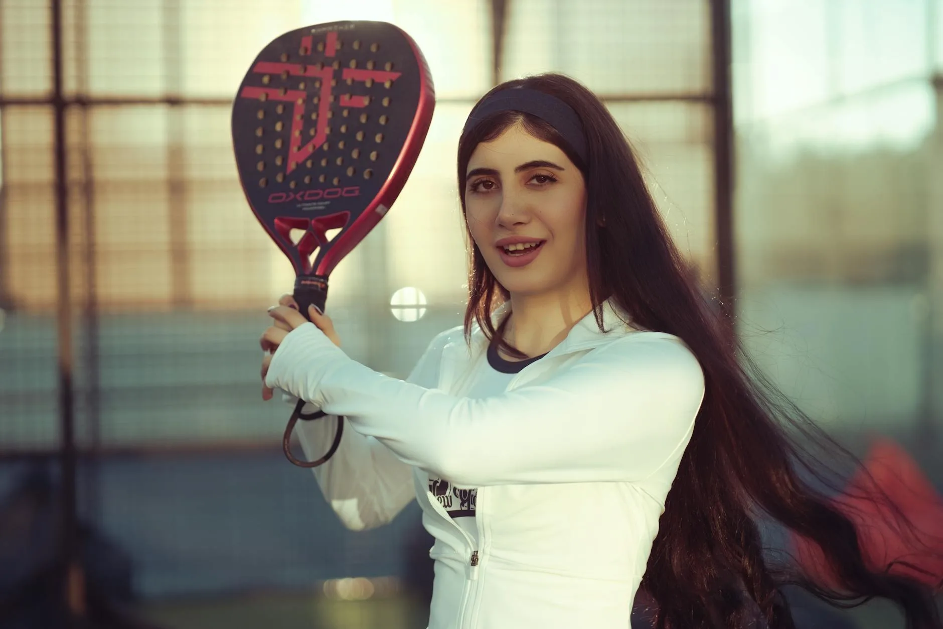 Close-up of a padel racket face showing textured surface