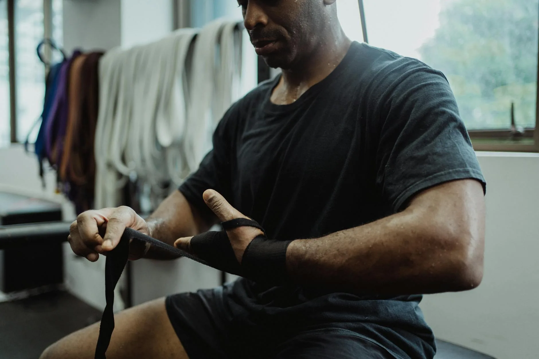 Athletic tape wrapped around a hand for sport