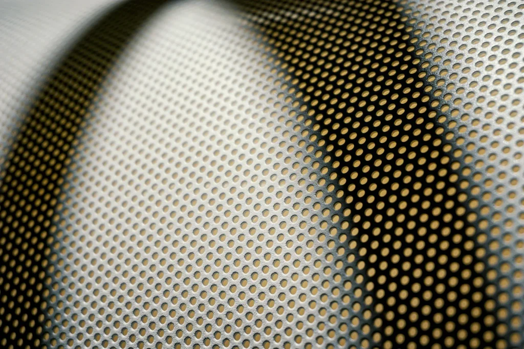 Padel racket and ball close up on a court surface