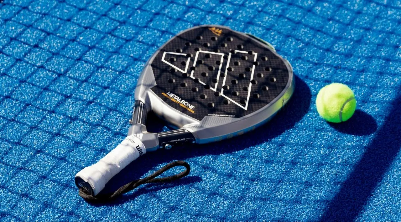 Close-up of a racket grip with overgrip tape