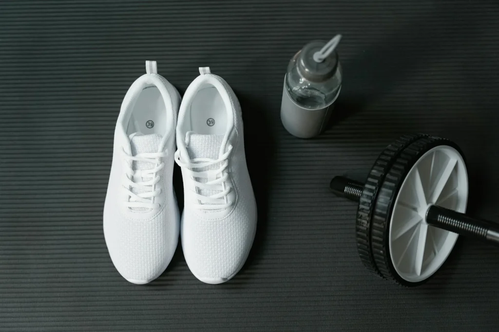 White sports shoes arranged together showing different brands