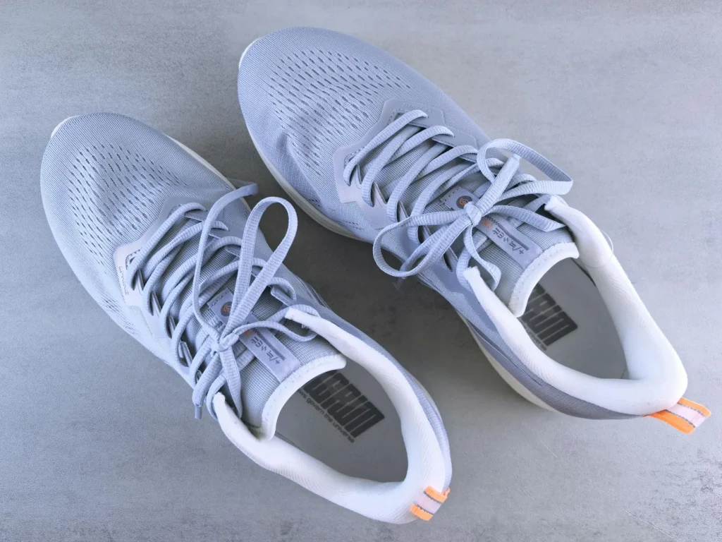 Athletic court shoes closeup showing grip sole and cushioning