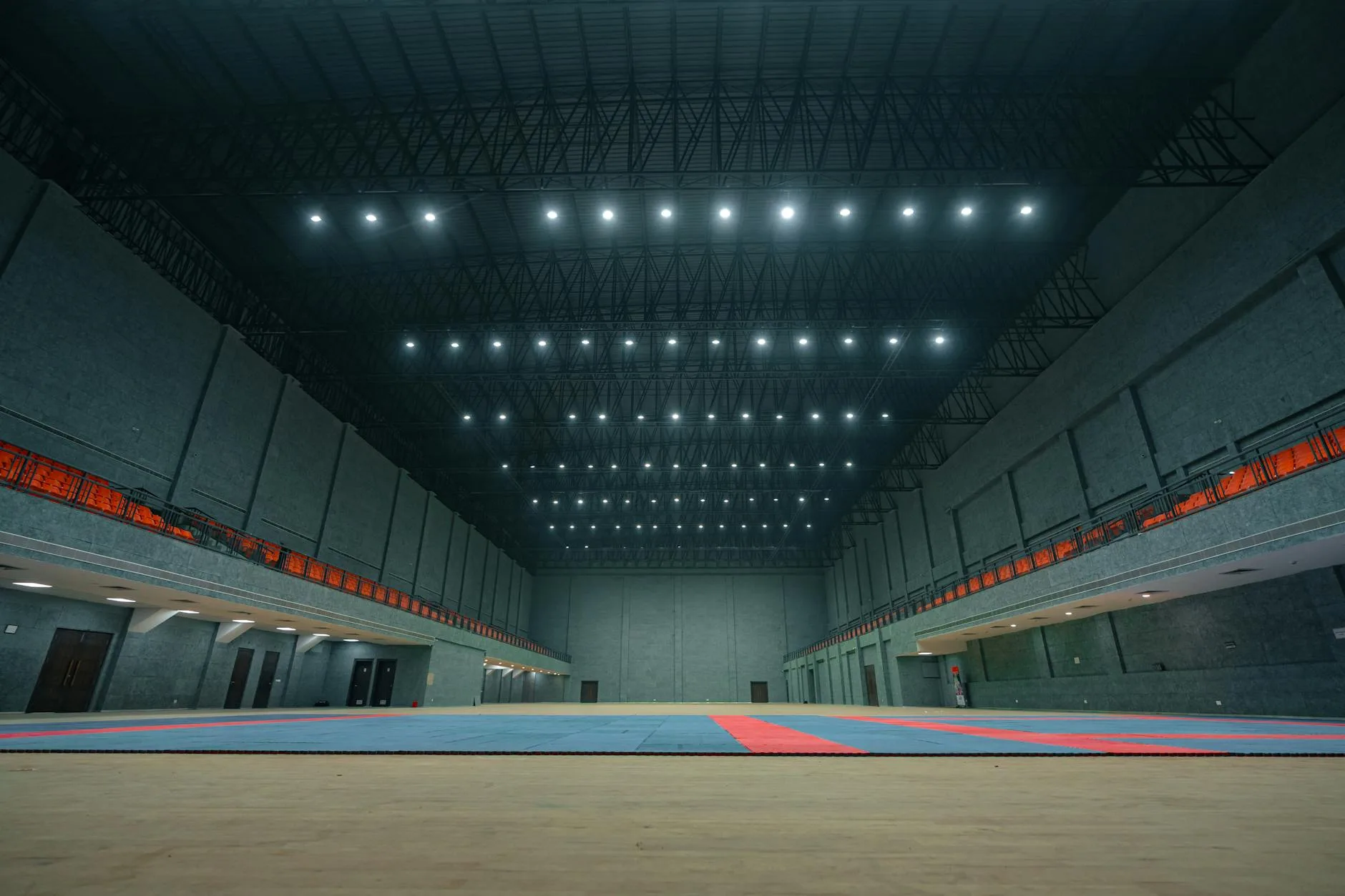 Professional padel match on an indoor court