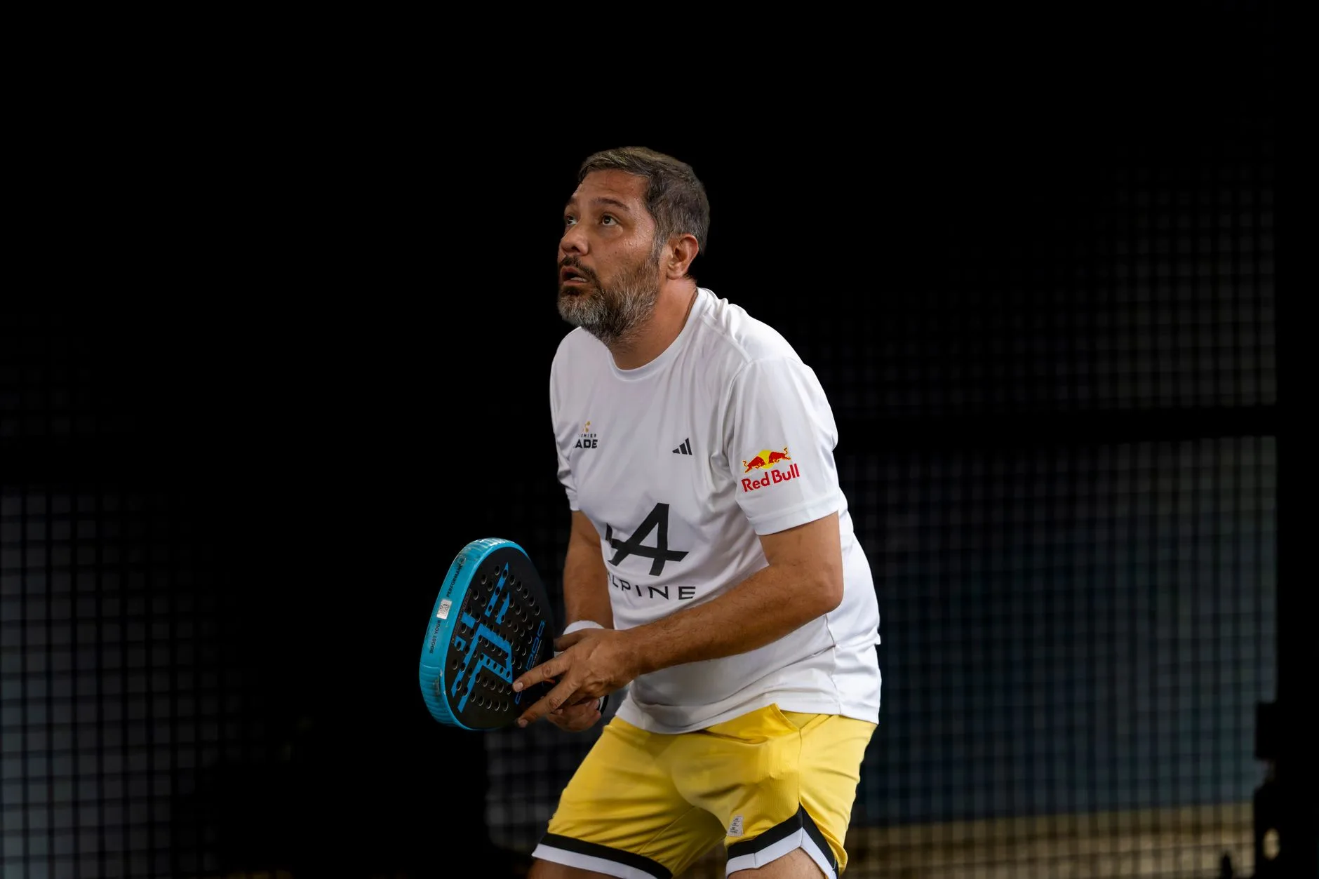 Padel player ready for a pressure point on court