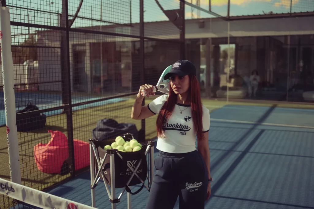 Padel racket on court for comparing head-heavy and head-light balance